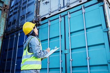 Image showing Checklist, cargo and container management by woman, working with delivery and logistics. Shipping, stock and supply chain inspection by lady writing on clipboard, industry control and freight storage