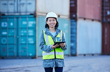 Image showing Supply chain, tablet and logistics with a woman shipping worker on a commercial container dock. Internet, stock and cargo with an asian female courier at work in the freight industry for export