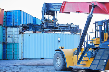 Image showing Logistics, container and truck moving cargo on an international and global shipping port. Supply chain, delivery and freight transport stock to be export, transport and courier to distribution center