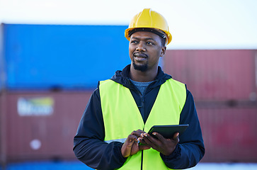 Image showing Tablet, black man and cargo planning logistics for shipping company, shipyard and container storage while confident. Business man, hard hat and strategy for freight import or export for supply chain.