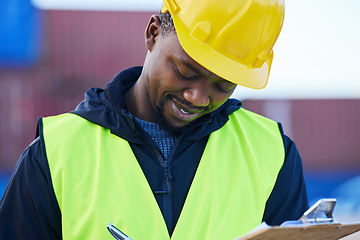 Image showing Logistics, shipping and checklist by black man engineer writing delivery inspection report for control of cargo containers at port. African supply chain worker doing distribution work at warehouse