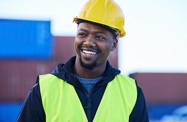 Image showing Shipping, supply chain and logistics with a black man working on a commercial container dock. Delivery, freight and cargo with a mature male courier at work outside in the export and import industry