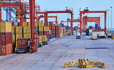 Image showing Shipping logistics cargo, commercial distribution import and storage of export freight stock in container port. Transportation, ecommerce courier delivery from a warehouse and supply chain management