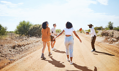 Image showing Freedom, countryside and friends walking on adventure in summer, bonding on dirt road in nature. Wellness, journey and holiday in Mexico with happy, relax and cheerful men and women enjoying vacation