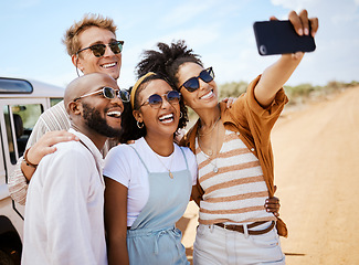 Image showing Safari, travel and friends phone selfie for social media with multiracial people on dirt road. Diverse friendship group enjoying bush holiday together in South Africa with smartphone photograph.