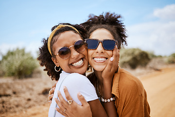 Image showing Couple travel portrait, Dubai desert with summer sunglasses or care free tourism road trip together. Happy black women friends in outdoor vacation, smile on faces in natural sandy street on adventure