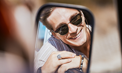Image showing Car mirror reflection, road trip and face of man happy, smile or relax with sunglasses on Sydney Australia tour. Transportation, happiness and young gen z person travel for peace, freedom or wellness
