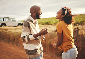 Image showing Conversation, couple and road trip travel on a dirt road feeling happy about vacation freedom. Communication and laughing of a girlfriend and boyfriend with happiness talking about a holiday together