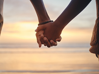 Image showing Trust, love and holding hands with couple by the beach together for support, happy and relax on Miami summer vacation. Sunset, vision and nature with black man and woman on peace holiday