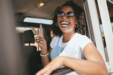 Image showing Woman, smile and road trip show peace in car, pickup or truck for vacation, holiday and relax. Girl, happy and smile in portrait in jeep, vehicle or van on travel on road, street or highway in Africa