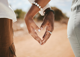 Image showing Couple hands, heart and love, kindness and trust with support together outdoors. Closeup fingers sign of black people shape in romantic relationship, celebrate honeymoon and save the date marriage