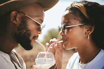 Image showing Outdoor couple sharing straw drink, summer date and sunshine vacation together in Brazil. Young black people face, love and happiness to share drinking romance, relax and holiday fun in garden park