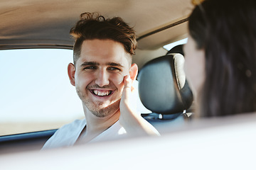 Image showing Embrace, smile and couple driving in a car for roadtrip holiday together in Costa Rica. Young man and woman with affection, happy on love vacation and drive with motor transportation for peace