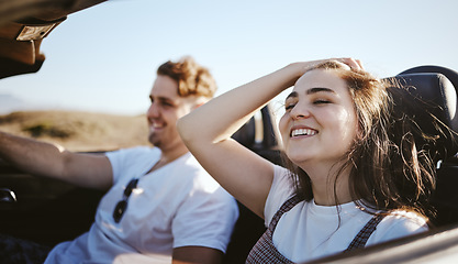 Image showing Road trip couple, summer vacation and freedom sunshine, relax and adventure in Miami Florida. Traveling woman, driving man and happy journey drive, date and holiday together in auto convertible car