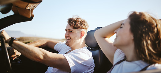 Image showing Road trip, happy couple and travel while in a convertible car for fresh air, adventure and journey with partner enjoying trip, love and freedom. Man and woman taking drive and traveling in Australia