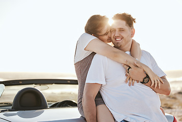 Image showing Road trip, couple and travel with a man and woman on vacation with a car in nature at sunrise. Love, happy and transport with a young male and female hugging while on holiday together in summer