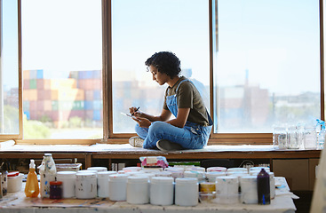 Image showing Tablet, creative and woman drawing on a mobile app for painting inspiration at a window in a studio. Indian designer, artist or painter on the internet for inspiration with tech in a workshop