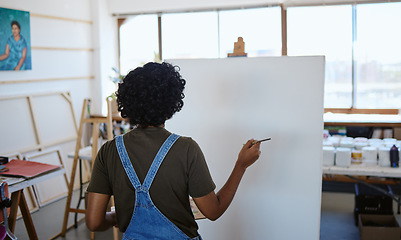 Image showing Art, paint and creative woman painting on canvas with inspiration in a workshop studio from behind. Back of an artist, designer or painter learning about creativity in class at an academy with vision