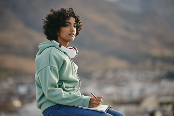 Image showing Writing, thinking and nature with a woman on the search for inspiration outdoor while working in a notebook. Idea, writer and author with a female listening to music and looking for motivation