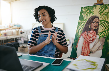 Image showing Video conference, presentation and painter talking about her painting on call with a computer in her work studio. Indian artist, designer and painter speaking about creative paint canvas on a webinar