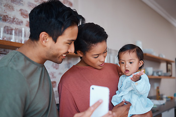 Image showing Down syndrome, phone and family for child education, learning and development on video in home. Baby, disability and smartphone with mom, dad and love in house for parents teaching with technology