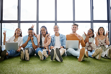 Image showing Friends, play and teamwork with a business team working on technology in their small business startup. Collaboration, design and creative with a man and woman employee group sitting on the floor