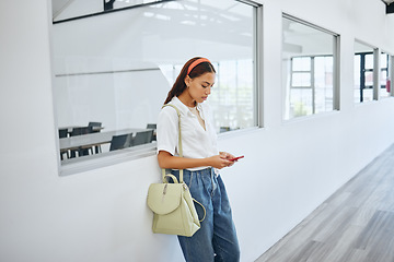 Image showing Girl, student and phone in college by classroom window in university for email, learning or social media. Woman, education and smartphone for communication, blog or study on app, web or internet