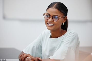 Image showing Woman, student and classroom focus with smile at college in lecture for education, learning and training. Girl, glasses and happy at school, university or class for lesson, study or scholarship