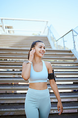 Image showing Fitness, exercise and music with a woman runner or athlete streaming radio outside for workout, training and health. Sports, healthy and cardio with a female listening on earphones while out on a run