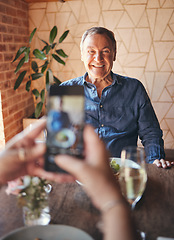 Image showing Senior man, phone and smile for picture on travel, vacation or restaurant experience while excited and happy at table. Elderly male tourist smiling for social media food post while traveling in Italy