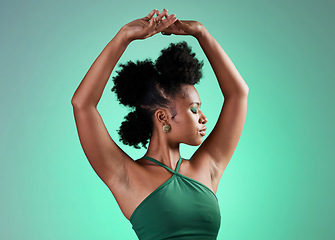 Image showing Black woman, fashion and dance model pose of a person from Jamaica confident. Beauty and female empowerment of a salsa dancing and posing dancer with confidence in a studio with a green background