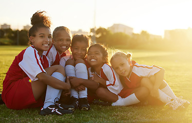 Image showing Girl kids, soccer field and team portrait together for competition, game and summer training outdoors in Brazil. Football club, happy young children and sports diversity in development, youth and fun