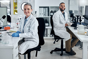 Image showing Science, research and innovation with a man and woman scientist working in a medical lab together. Healthcare, analytics and discovery with a medicine team at work in a scientific laboratory