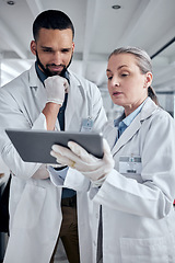 Image showing Tablet, science and research with a man and woman scientist working on the internet in their laboratory. Innovation, technology and analytics with a medicine team at work in collaboration in the lab