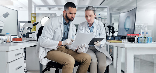 Image showing Scientist partnership document for medical research laboratory discussion in healthcare science future innovation report. Man and woman doctor teamwork talk on exam or test analysis biology paperwork