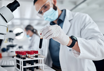 Image showing Covid, science and blood with doctor in laboratory with a face mask, working on vaccine, medical and research investigation. Innovation, healthcare and medicine with expert scientist for pharmacy