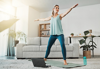 Image showing Yoga, online workout and woman training with stretching exercise on the internet in living room of house. Girl doing pilates for focus, energy and fitness health with video on technology in home