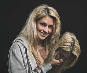 Image showing Mental health, schizophrenia and bipolar with an insane woman in studio on a dark background for anxiety, fear or paranoia. Psychology, crazy and mad with a mentally ill female holding her own head