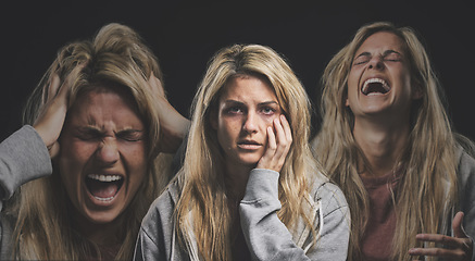 Image showing Portrait of a woman with depression, schizophrenia and mental health problem. Mockup for person with mental illness, bipolar disorder and anxiety. Angry, screaming and depressed crying girl in studio