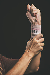 Image showing Help, suicide and injury for hand of man with depression, mental health problem or anxiety. Dark fear, self harm fail and sad mentally ill person with pain, wrist bandage and depressed over life