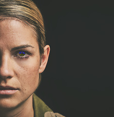 Image showing Face, retina scan and mockup with a woman in studio on a dark background for security or data protection. Future, digital and ai with a female robot eye scanning for identity or technology innovation