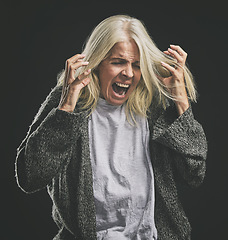 Image showing Frustrated, angry scream of elderly woman with mental health issue in retirement with mock up. Rage of senior lady suffering with anger, ptsd and depression problem in old age shouting.