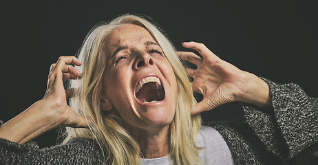 Image showing Screaming senior woman, mental health and depression from bipolar anxiety, stress and scary fear on black background. Schizophrenia, psychology and crazy person shout, drugs problem and epilepsy risk