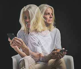 Image showing Phone communication, bipolar and senior woman typing on mobile app with mental health problem against a black mockup studio background. Elderly person with schizophrenia, depression or anxiety on web