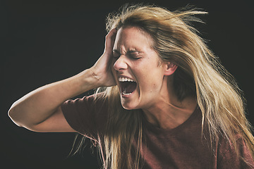 Image showing Anxiety, frustrated and trauma woman crying in dark studio for psychology and mental health mock up. Depressed, bipolar or angry girl shout for depression, mental health problem on a black background