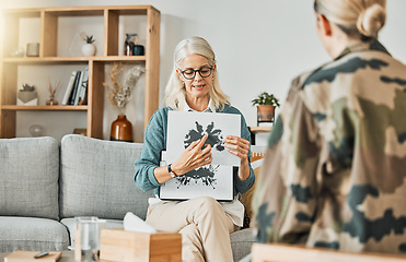 Image showing Mental health, therapy and ink with a woman psychologist showing a picture to a patient during a counseling session. Psychology, medical and health with a female therapist or counselor at work