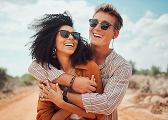 Image showing Couple, happy and smile hug in nature on a travel, adventure and road trip outdoor. Happiness of traveling girlfriend and boyfriend together in the summer sun with quality holiday time in the dessert