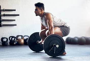 Image showing Workout, weightlifting and man doing deadlift training with strength, weights and motivation in fitness gym. Bodybuilder, sport and strong athlete doing power exercise with a dumbbell at health club