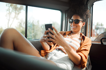 Image showing Black woman, phone and road trip in van vacation, holiday or summer trip. Relax, travel and female from Brazil on mobile, social media or text message while spending quality time alone in car
