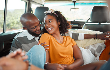 Image showing Love, travel and couple on a road trip, talking, laughing and bonding in a car together. Happy, adventure and black woman smiling and relax with cheerful man, having fun, sharing joke and enjoy trip